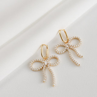Pearl Studded Bow Dangle Earrings