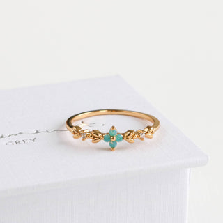 Statement Grey gold-plated ring featuring an aqua opal blossom, vine leaf details, and sparkling cubic zirconia stones.