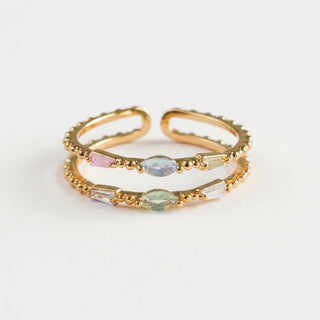 Statement Grey double beaded gold ring featuring marquise and baguette cut pastel cubic zirconia gemstones.