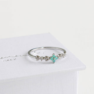 Statement Grey silver-toned ring featuring a delicate aqua opal blossom, vine leaves, and sparkling cubic zirconia stones.